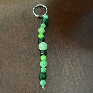 A green beaded keychain
